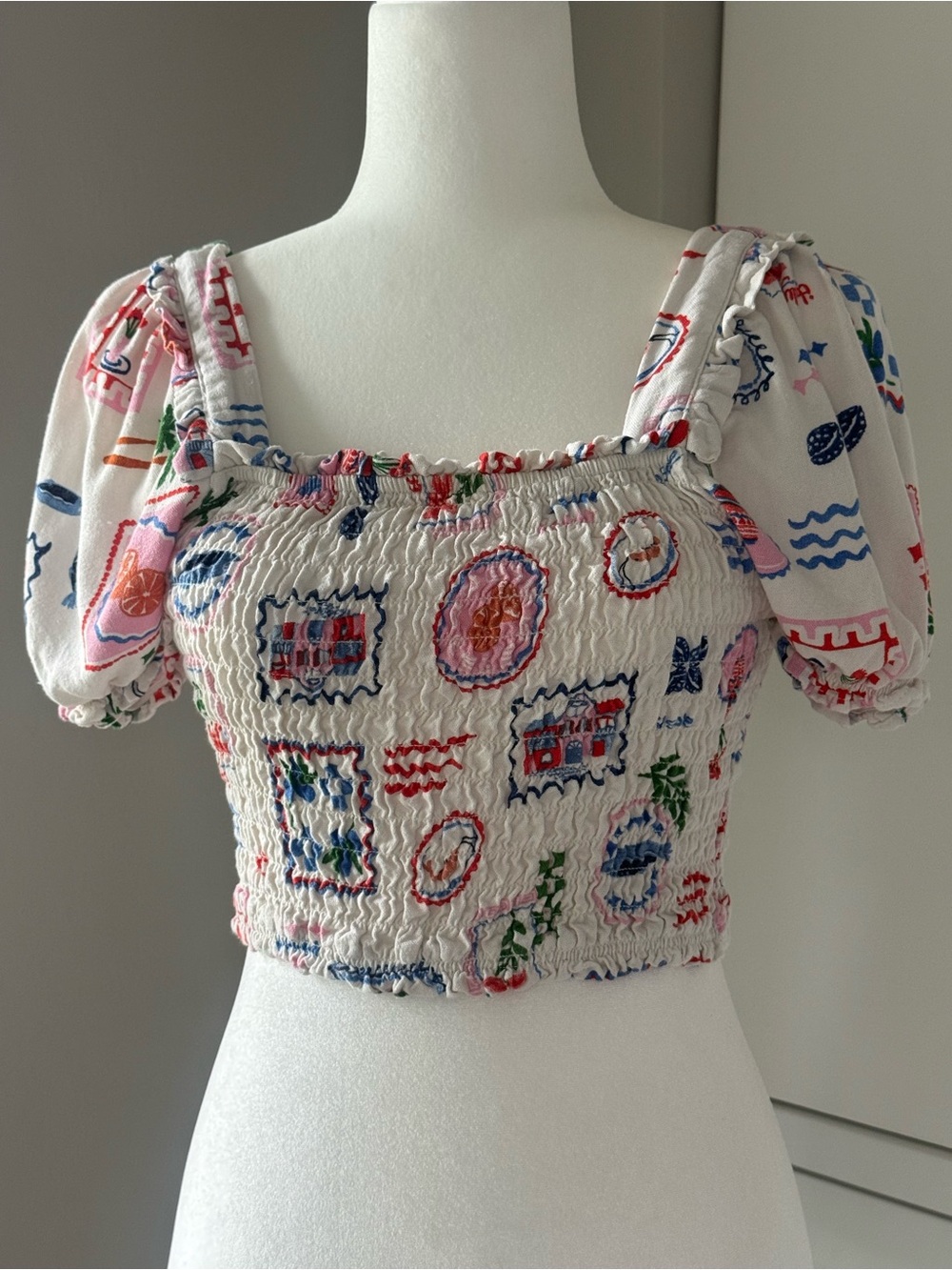 Smocked Multicolor Motif Crop Top in Cream